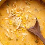 Bowl of creamy Southwest Chicken Corn Chowder topped with fresh herbs