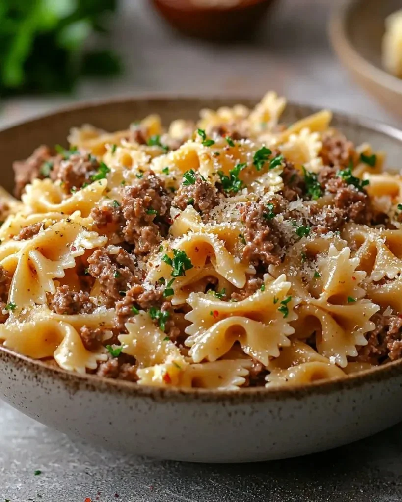 Garlic Butter Bowtie Pasta with Beef served in a bowl