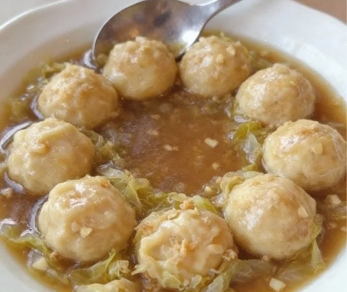 Delicious German cabbage and dumplings served in a bowl