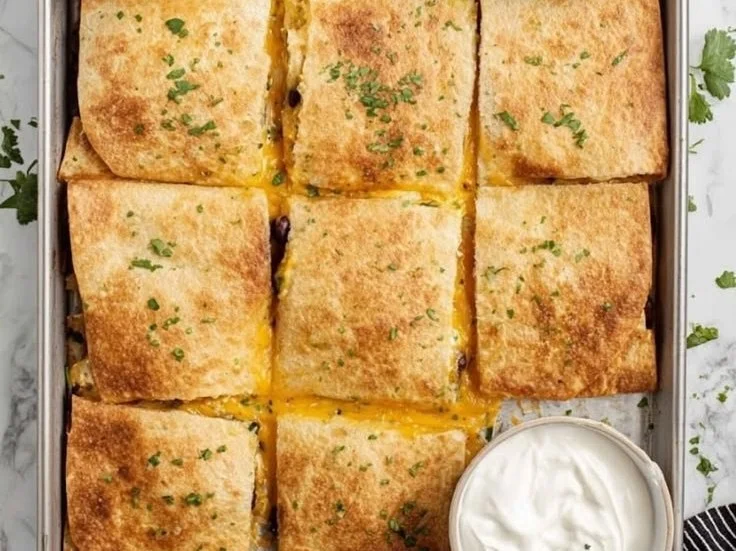 Delicious Sheet Pan Chicken Quesadillas ready to serve on a plate