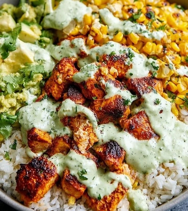 Delicious Street Corn Chicken Rice Bowl garnished with fresh ingredients