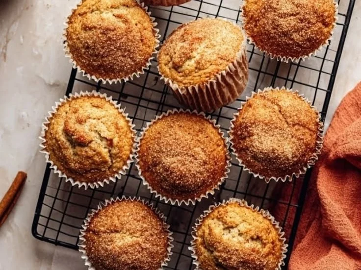 Vegan cinnamon swirl muffins freshly baked and ready to enjoy.