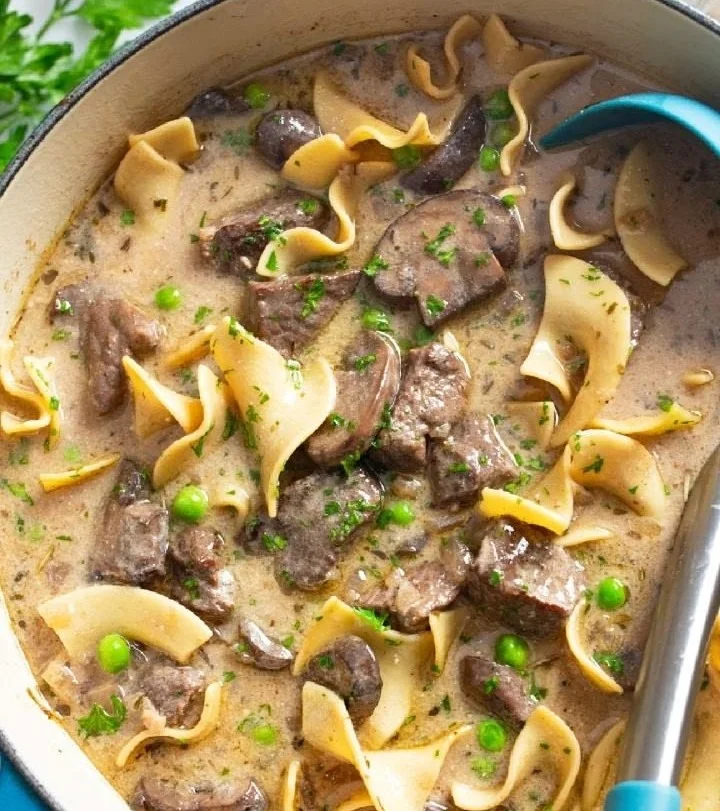 A bowl of Beef Stroganoff Soup with tender beef and creamy sauce.
