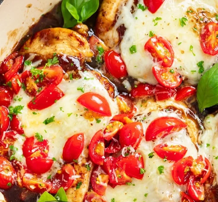Delicious Bruschetta Chicken served with fresh tomatoes and basil