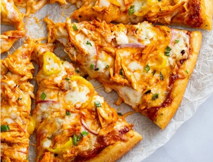 Delicious Buffalo Chicken Pizza with spicy chicken and ranch dressing