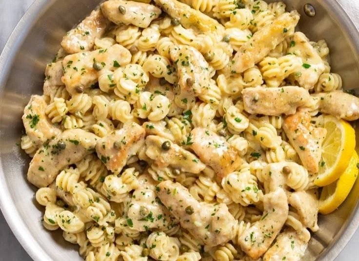 Delicious Chicken Piccata Pasta with lemon and capers served on a plate