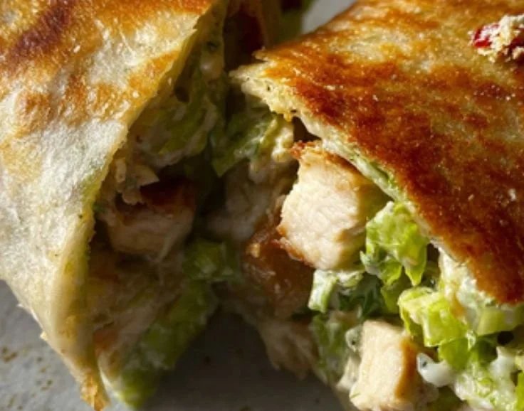 Chopped Chicken Caesar Salad Wrap with fresh ingredients and creamy dressing