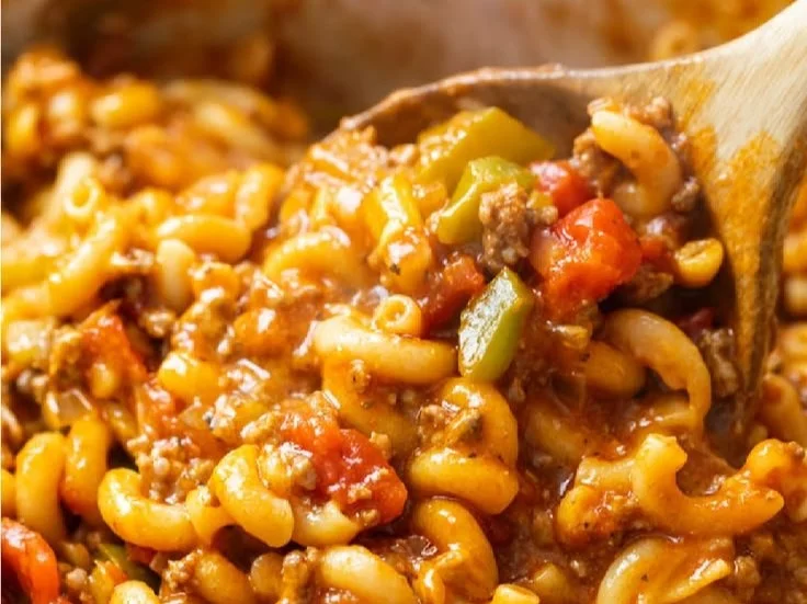 Delicious Classic American Chop Suey served in a bowl with vegetables and ground meat