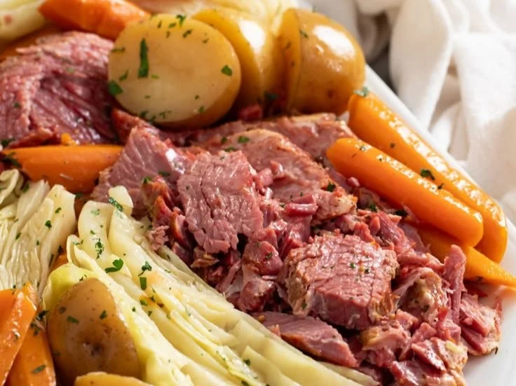 Delicious corned beef and cabbage served on a plate, perfect for St. Patrick's Day.