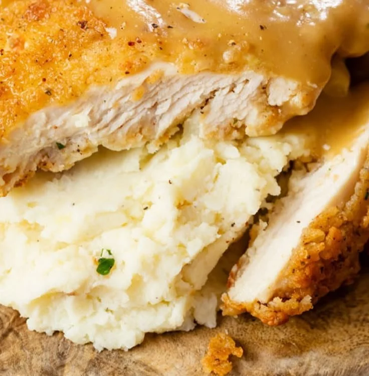 Delicious plate of Country Fried Chicken served with sides