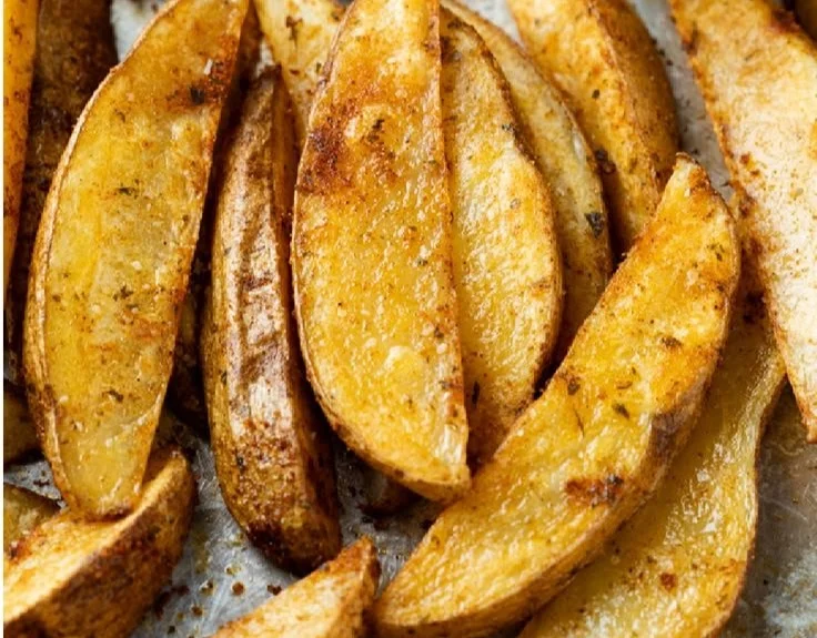 Crispy potato wedges seasoned and baked to perfection