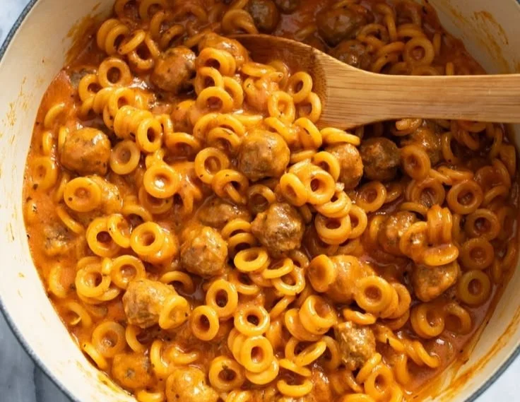 A bowl of homemade Spaghettios with pasta and tomato sauce