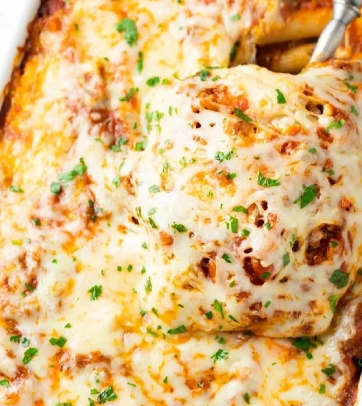 Delicious homemade Pasta Bake topped with melted cheese and herbs