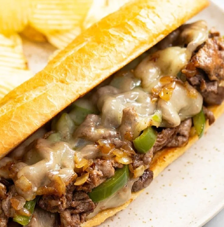 Delicious Philly Cheesesteak sandwich with cheese and grilled steak