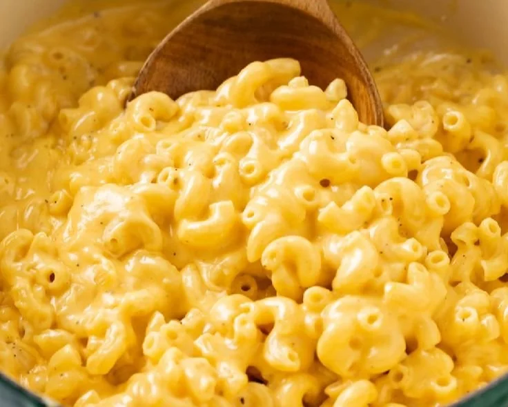 Creamy stovetop mac and cheese in a pot, ready to serve.