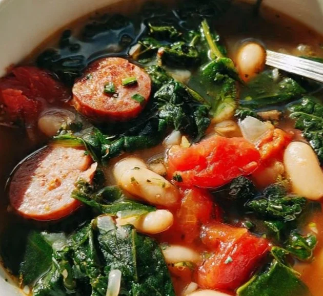 Bowl of swamp soup with fresh herbs and vegetables