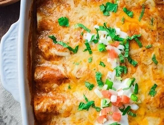 30 minute cheese enchiladas topped with melted cheese and salsa
