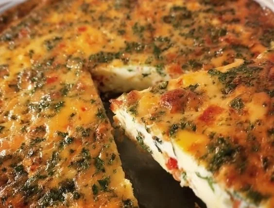 Crustless egg white quiche loaded with vegetables and herbs