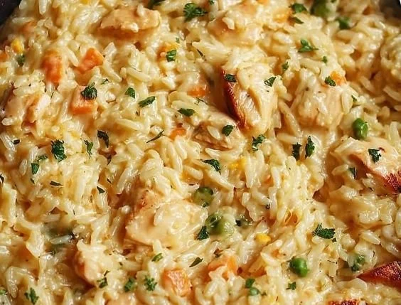 Delicious creamy chicken and rice skillet ready to serve