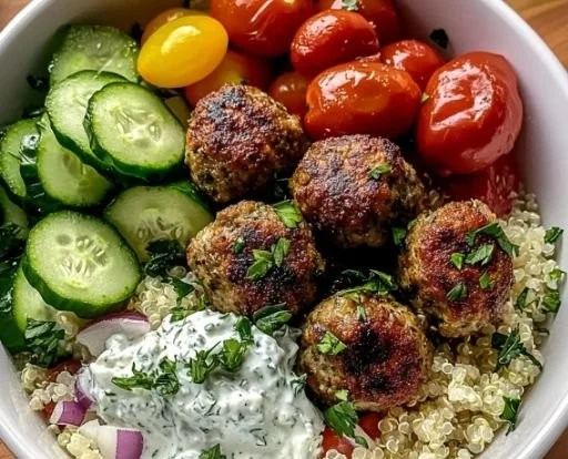 Delicious Greek meatball bowl with fresh ingredients and vibrant flavors