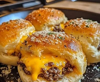 Delicious Garlic Parmesan Cheeseburger Bombs served with dipping sauce