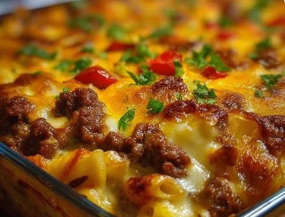 Delicious Hamburger Supreme Casserole fresh out of the oven with toppings.