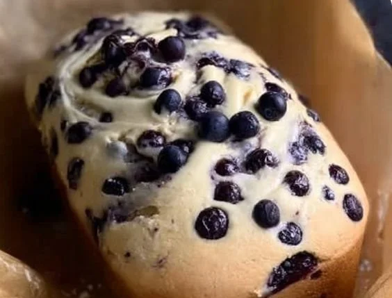 Heavenly blueberry cream cheese loaf with fresh blueberries and cream cheese swirls