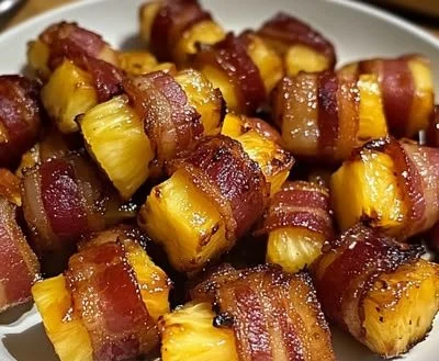 Delicious bacon wrapped pineapple bites ready to be enjoyed