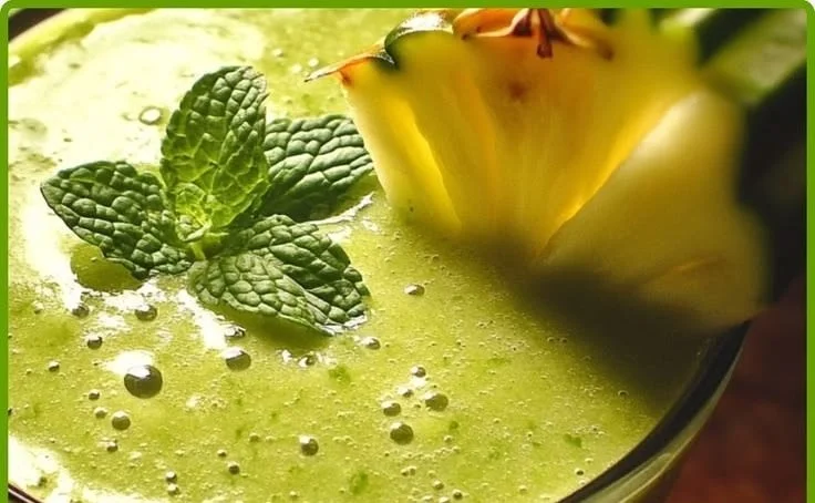 Refreshing pineapple cucumber mint green smoothie in a glass