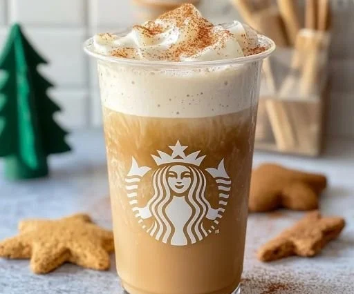 Iced gingerbread chai latte with oat milk in a festive setting