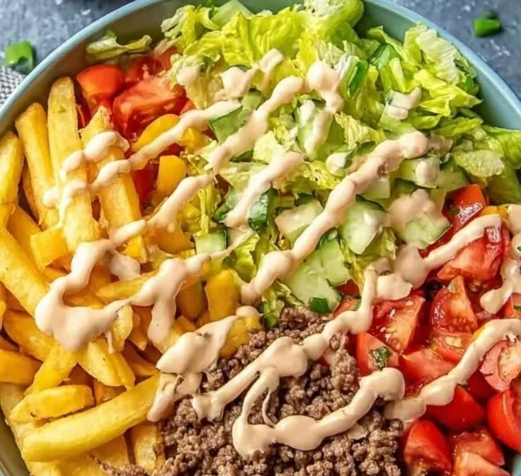 A delicious Big Mac Bowl featuring layers of beef, lettuce, cheese, and special sauce.