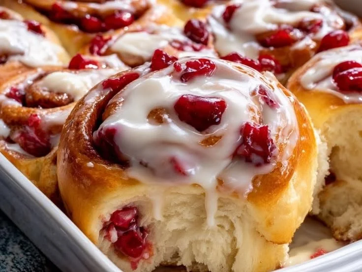 Homemade Cherry Cinnamon Rolls baked to perfection with a sweet cherry filling.