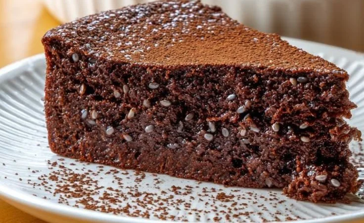 Delicious chocolate cake topped with chia seeds for a healthy dessert option