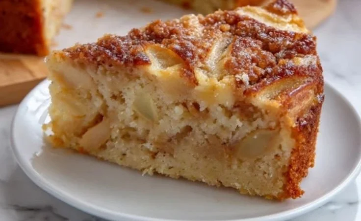 Delicious flourless apple cinnamon cake topped with fresh apples and cinnamon.