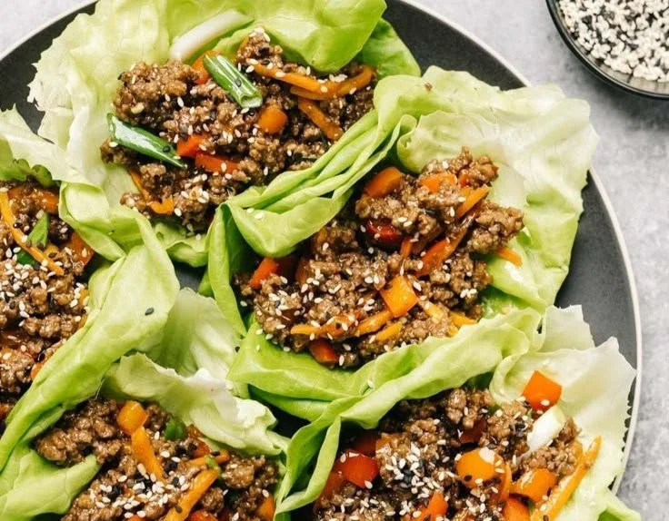 Ground Beef Lettuce Wraps served with fresh vegetables and savory sauce