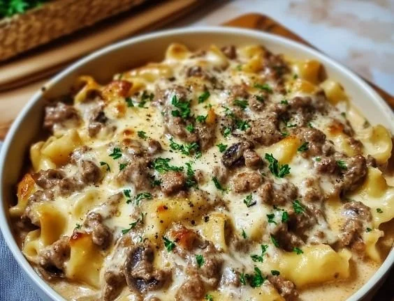 Delicious ground turkey stroganoff served over pasta with creamy sauce.