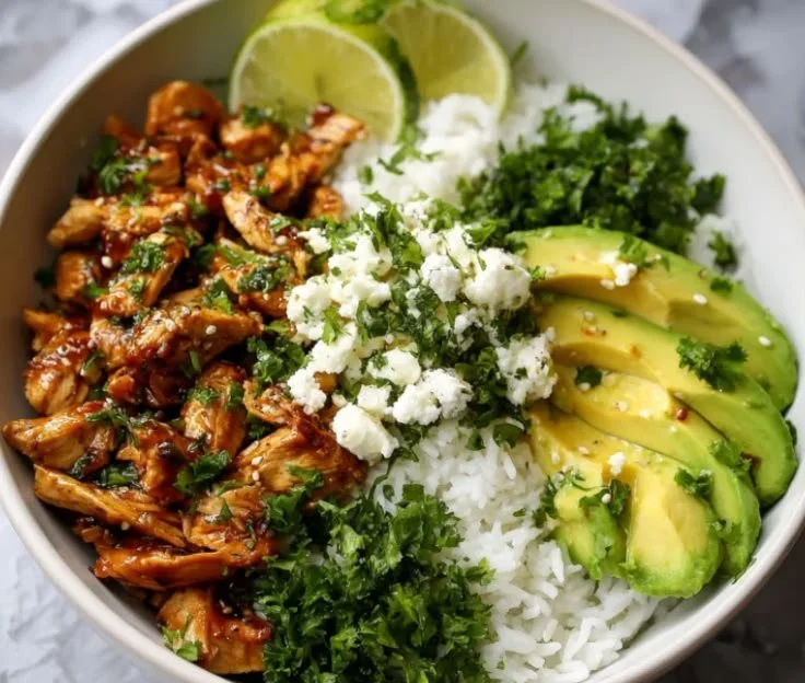 Honey Lime Chicken served in an avocado rice bowl for a high-protein meal