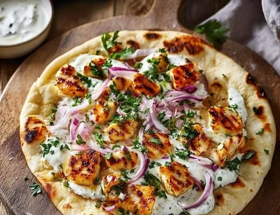 Hot Honey Halloumi Pitas served with fresh ingredients and drizzled with honey