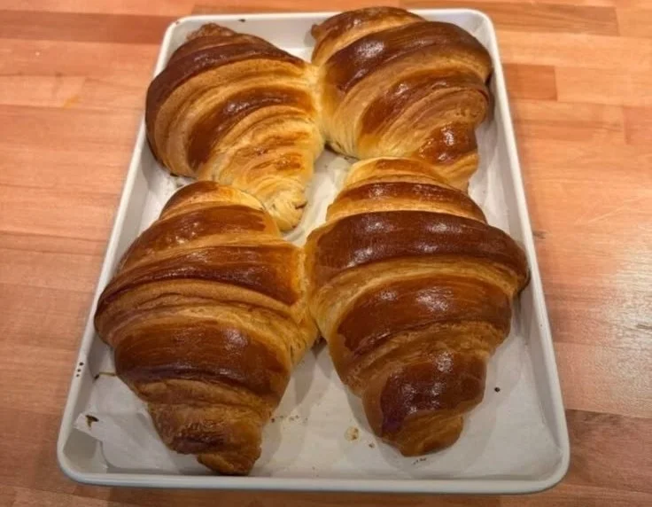 Freshly baked butter croissants golden and flaky for a breakfast treat