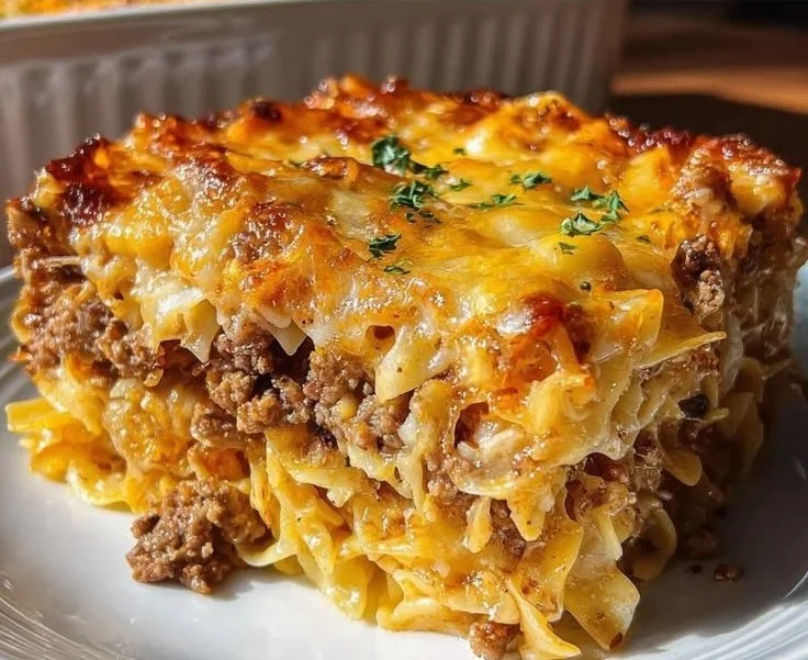 Delicious Sauerkraut Casserole served in a baking dish with melted cheese on top