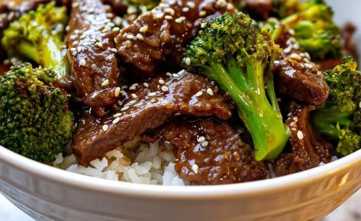 Slow cooker beef and broccoli dish ready to serve