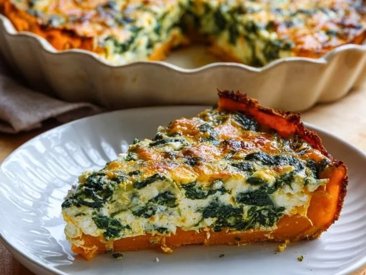 Sweet Potato Crust Spinach Quiche with fresh spinach and a golden crust