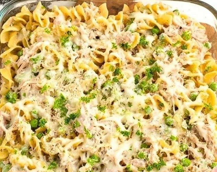 Delicious tuna casserole topped with crunchy breadcrumbs in a baking dish