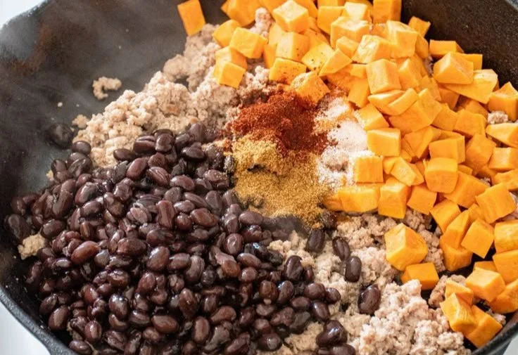 Delicious turkey sweet potato skillet cooked with vegetables and spices