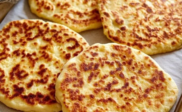 Two-ingredient cottage cheese flatbread on a serving plate
