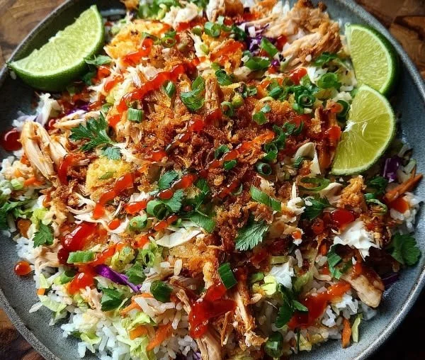 Bang Bang Chicken served with a side of Crispy Rice Salad on a plate