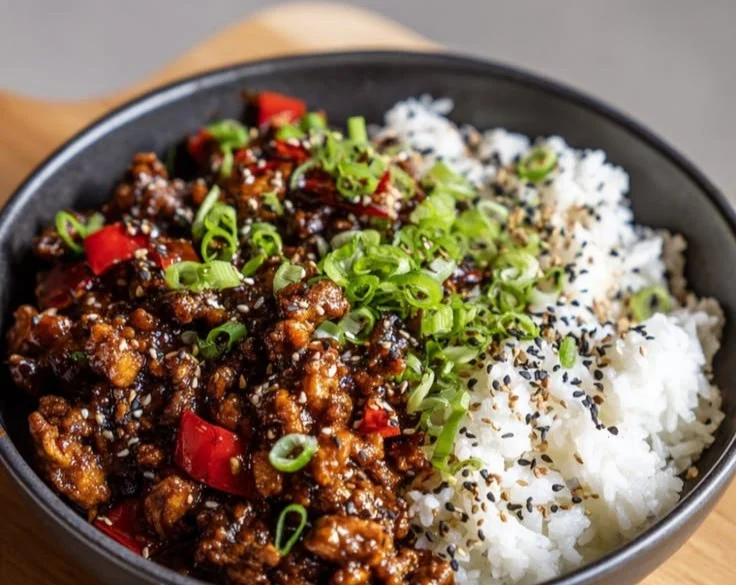 Firecracker Ground Chicken served on a plate with vibrant vegetables.