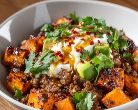 High Protein Hot Honey Beef Bowl with vibrant vegetables and spicy sauce