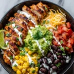 High protein taco bowl loaded with fresh ingredients and vibrant toppings