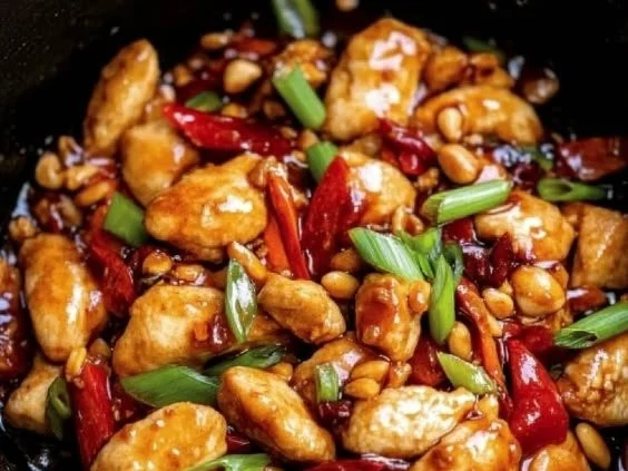 Delicious Kung Pao Chicken served with rice and vegetables